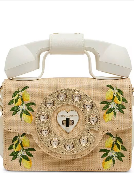 Betsey Johnson Handbags - BETSY JOHNSON PUCKER UP PHONE BAG NATURAL
